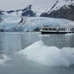 Portage Glacier Cruise is a 1 hour cruise on Portage Lake. This photo shows the 100 person day boat cruise sailing through the icy waters filled with bergie bits!